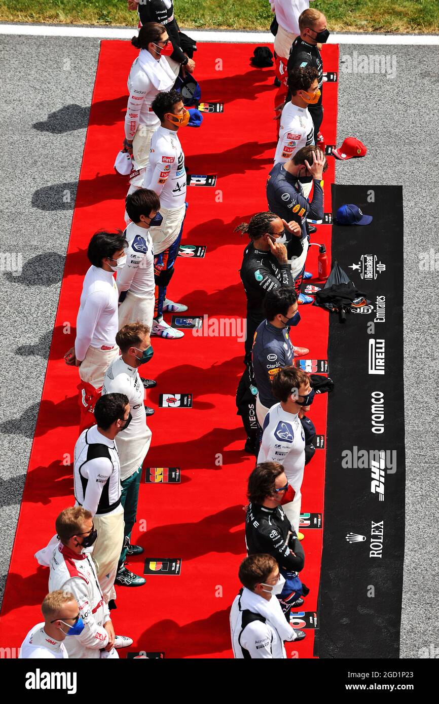 Drivers as the grid observes the national anthem. Steiermark Grand Prix