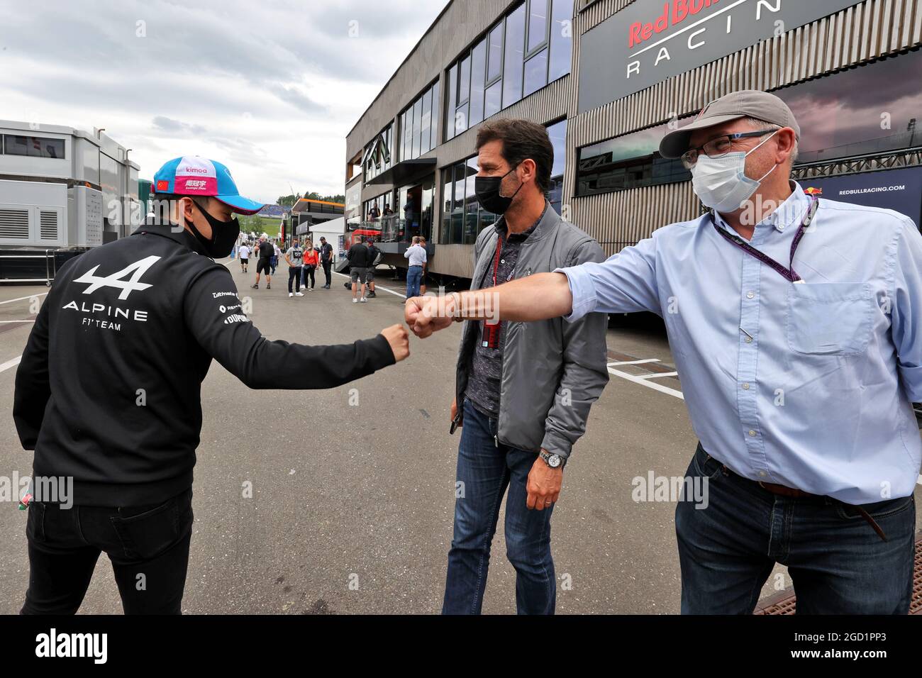 (L to R): Guanyu Zhou (CHN) Alpine F1 Team Test Driver with Mark Webber (AUS) Channel 4 Presenter and Joe Saward (GBR) Journalist. Austrian Grand Prix, Friday 2nd July 2021. Spielberg, Austria. Stock Photo