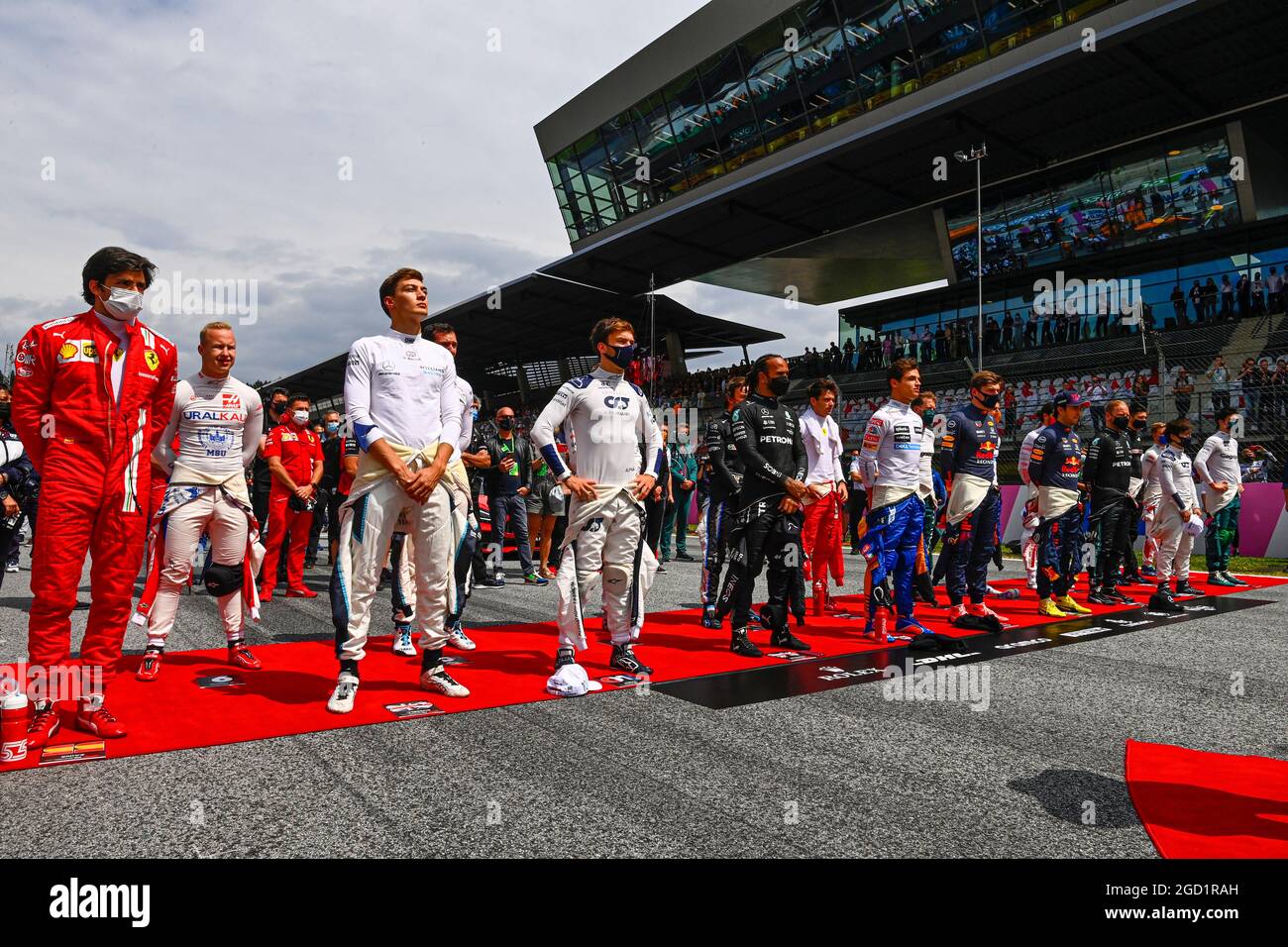 Drivers as the grid observes the national anthem. Austrian Grand Prix