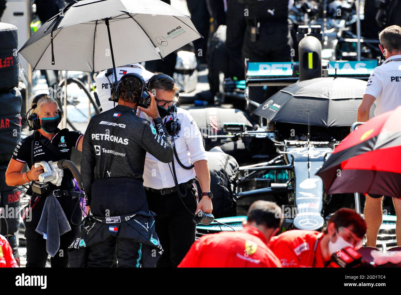 Lewis Hamilton (GBR) Mercedes AMG F1 with Peter Bonnington (GBR) Mercedes AMG F1 Race Engineer in the pits while the race is stopped. British Grand Prix, Sunday 18th July 2021. Silverstone, England. Stock Photo