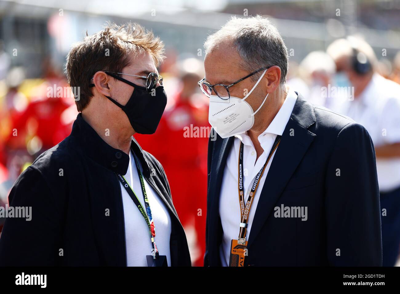 (L to R): Tom Cruise (GBR) Actor with Stefano Domenicali (ITA) Formula One President and CEO on the grid. British Grand Prix, Sunday 18th July 2021. Silverstone, England. FIA Pool Image for Editorial Use Only Stock Photo