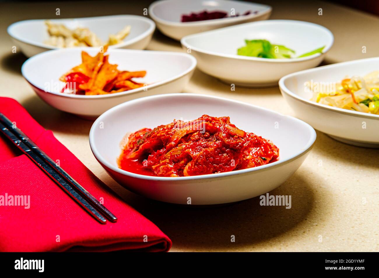 Korean dinner banchan side dishes including kimchi and soybeans Stock ...