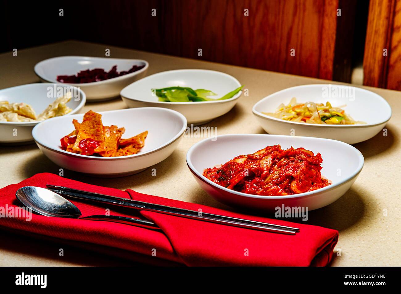 Korean dinner banchan side dishes including kimchi and soybeans Stock