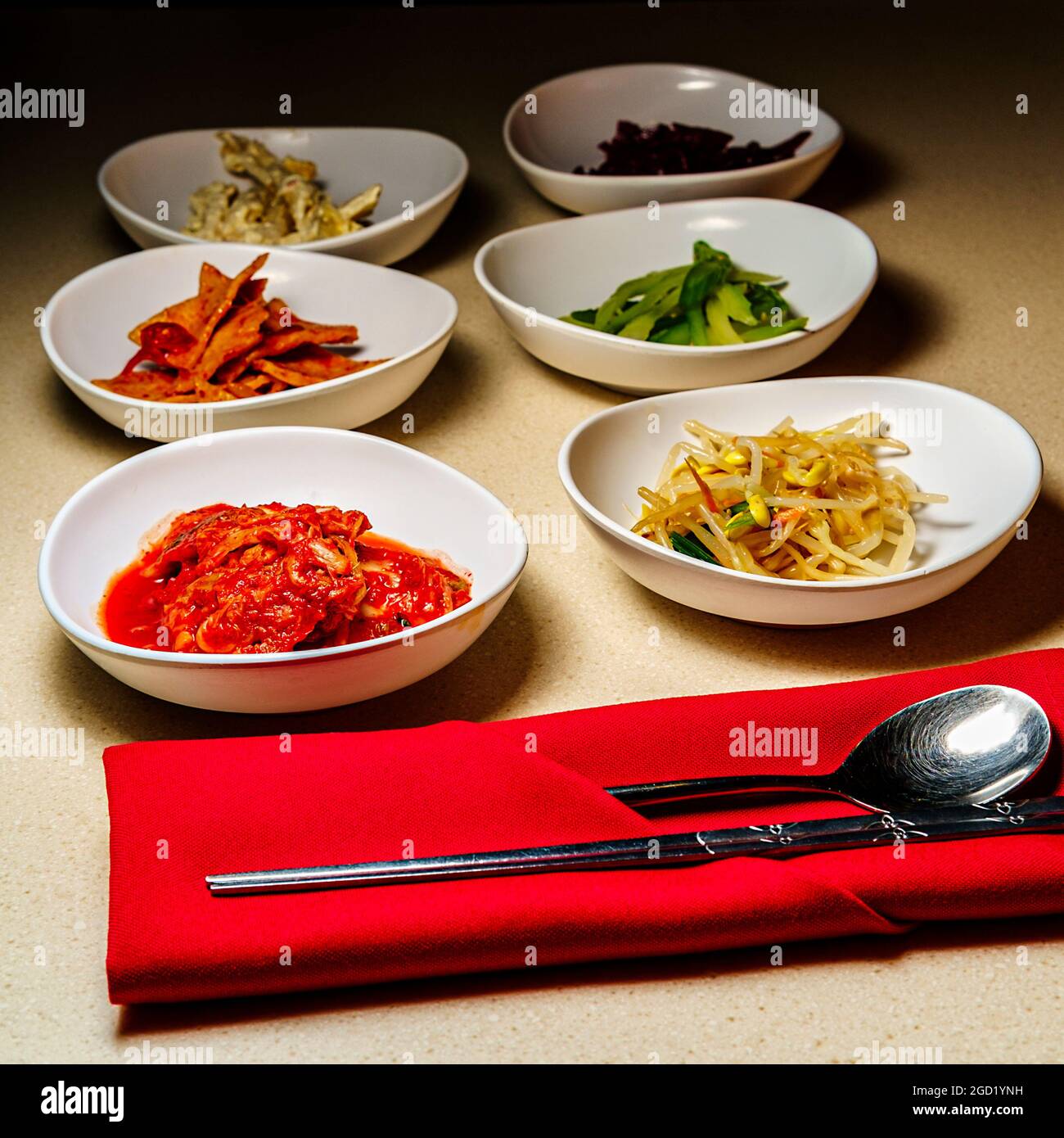 Korean dinner banchan side dishes including kimchi and soybeans Stock