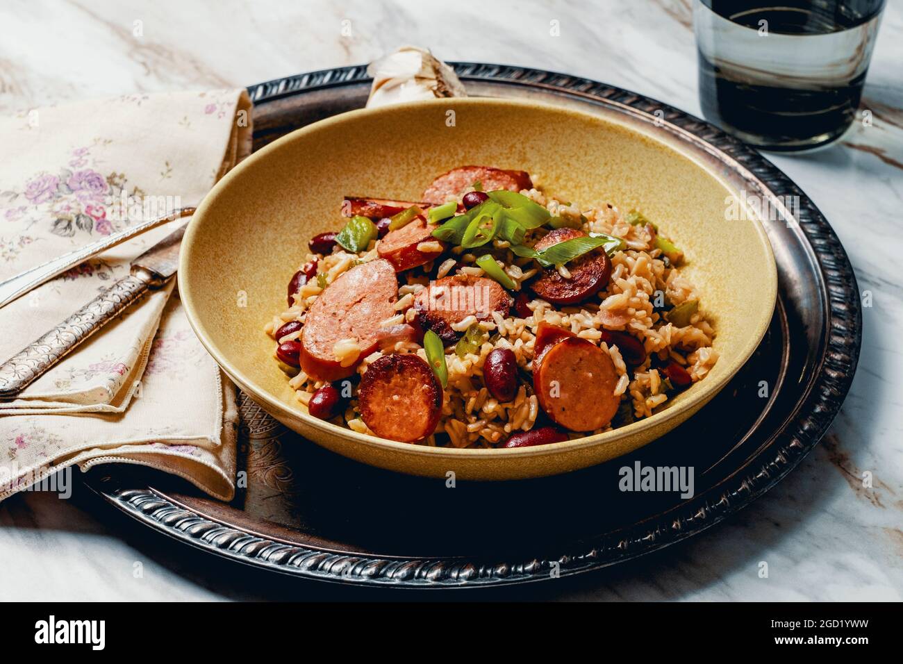 Skillet red beans and rice with smoked andouille sausage and scallion