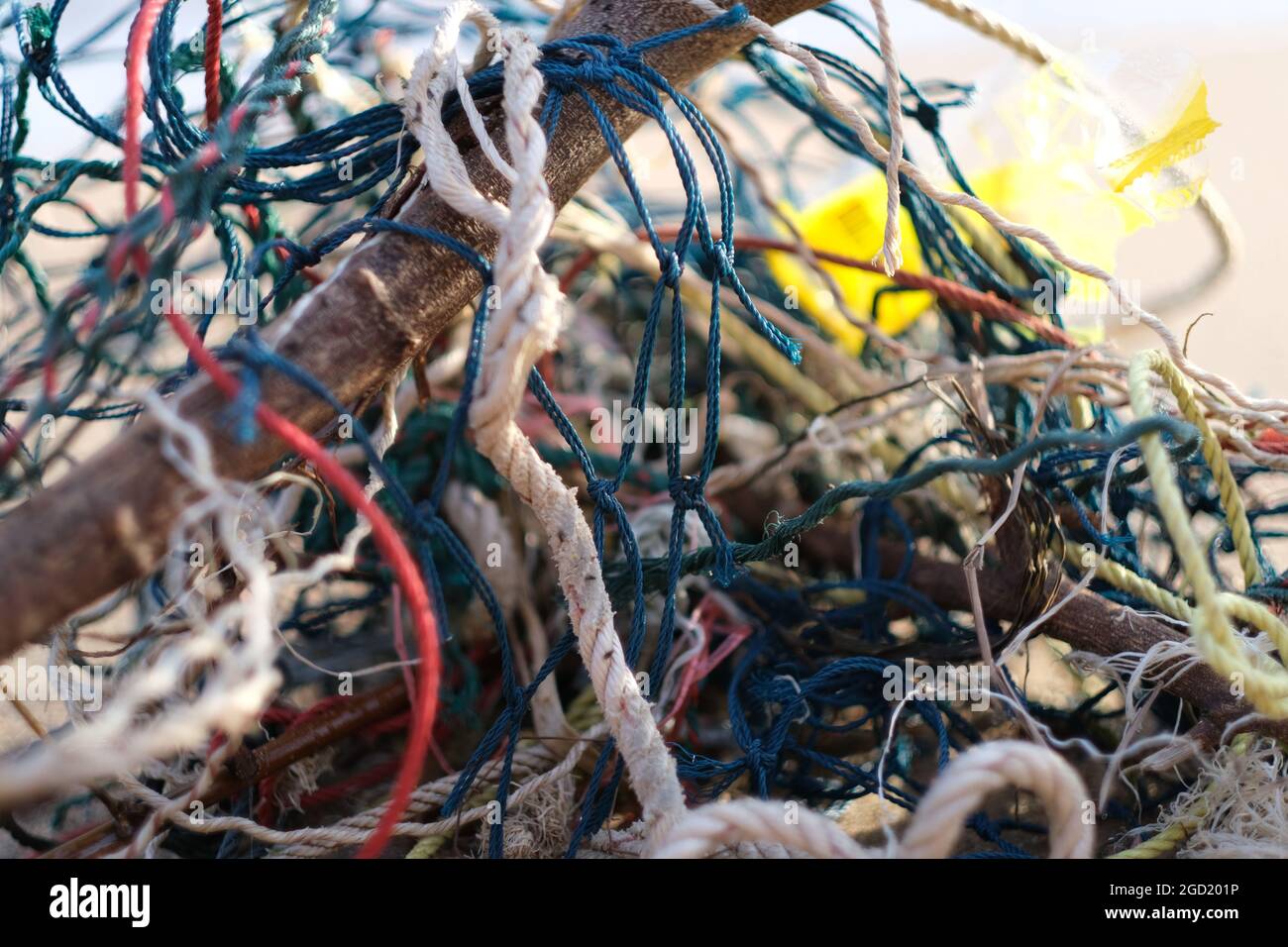 Full frame background of red plastic fishing net, which when abandoned  represents the majority of large plastic pollution in the oceans Stock  Photo - Alamy