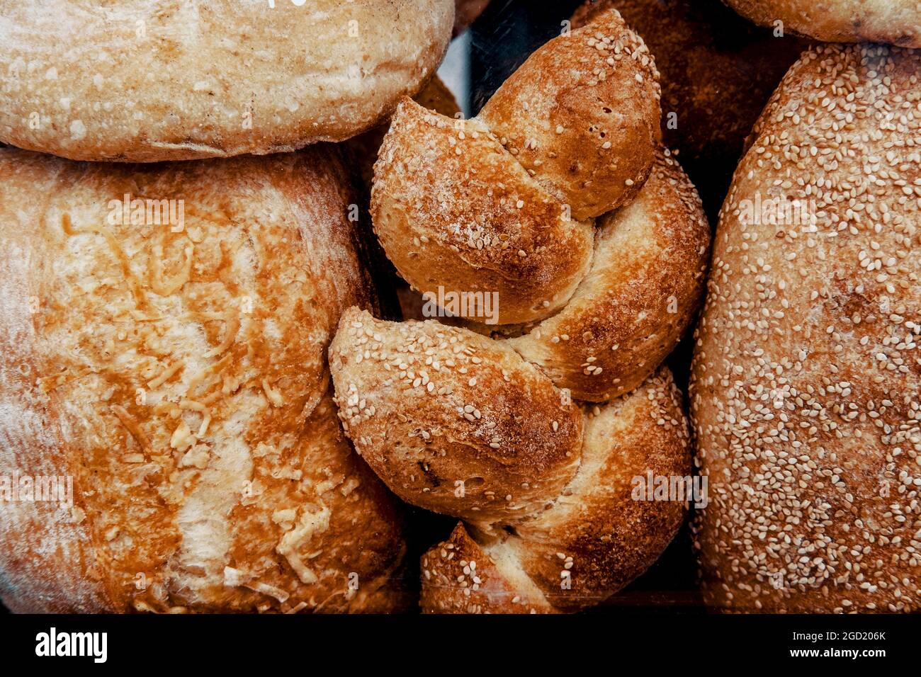 Epi Garlic asiago and semolina loaves of bread on display at local
