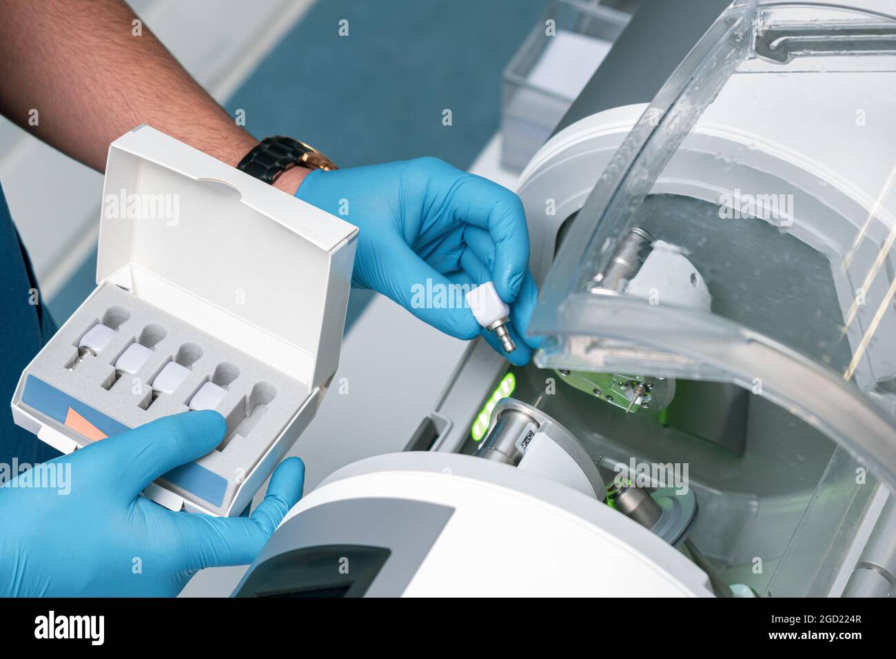 CAD CAM dental computer-aided machine. Digital modern dental laboratory for prosthesis and crowns milling Stock Photo