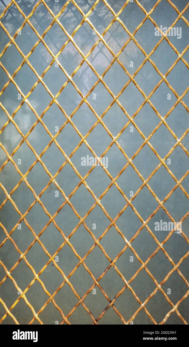 Detail of wire covering a window. Stock Photo