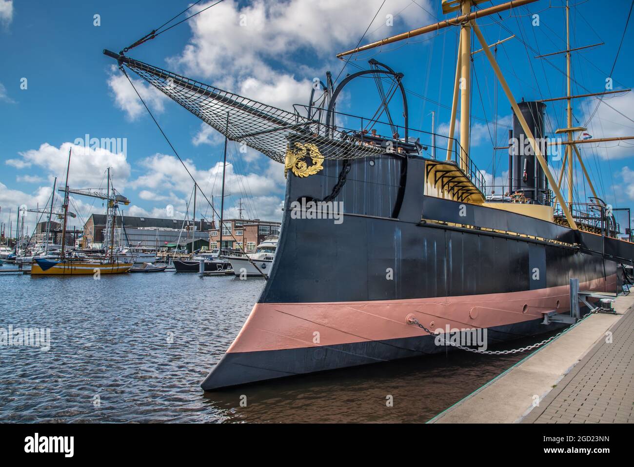 Den Helder, the Netherlands. July 31, 2021. Bow and stern of historical ram ship De Schorpioen at the quay of Willemsoord wharf at Den Helder. High quality photo Stock Photo