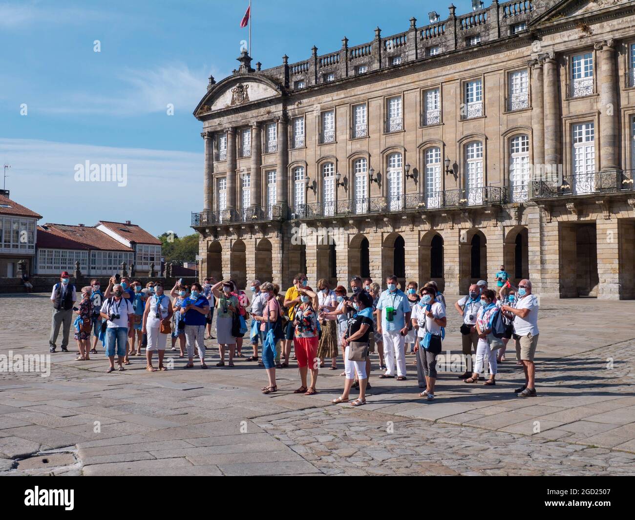SANTIAGO DE COMPOSTELA, SPAIN - September 13, 2020:  Tourists make photo of the Cathedral on the Obradoiro square in the Santiago de Compostela city d Stock Photo