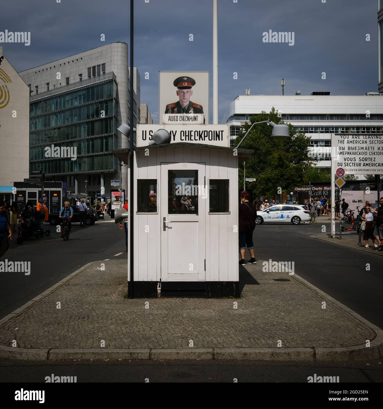 Symbol of the Cold War between East and West. Check Point Charlie is a tourist magnet for Berlin, Germany. Stock Photo
