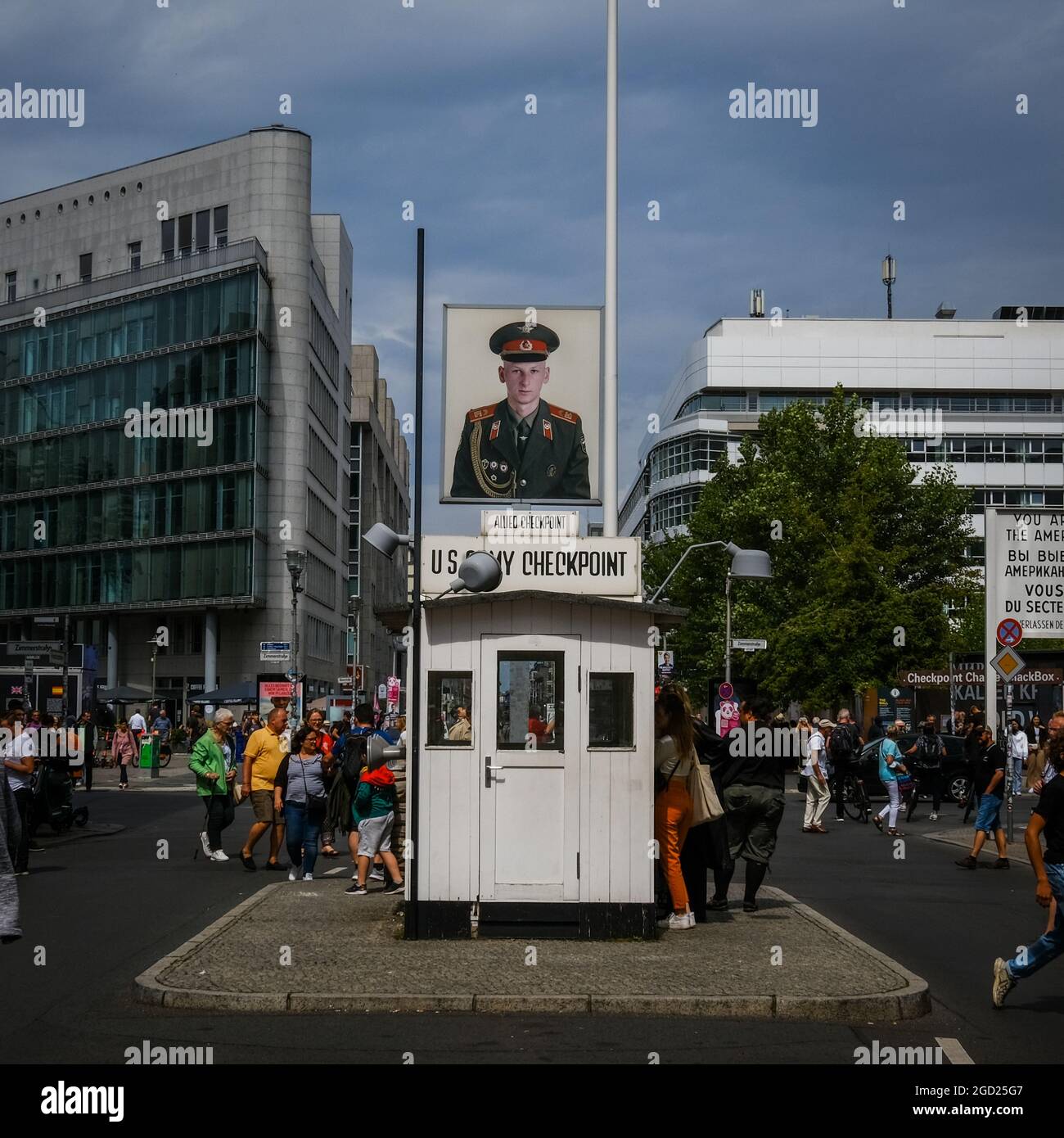 Symbol of the Cold War between East and West. Check Point Charlie is a tourist magnet for Berlin, Germany. Stock Photo