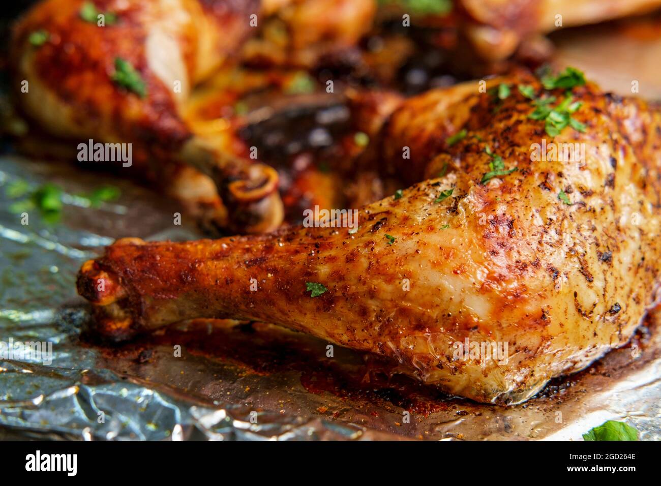Cooking Peruvian roast chicken leg dinner Stock Photo Alamy