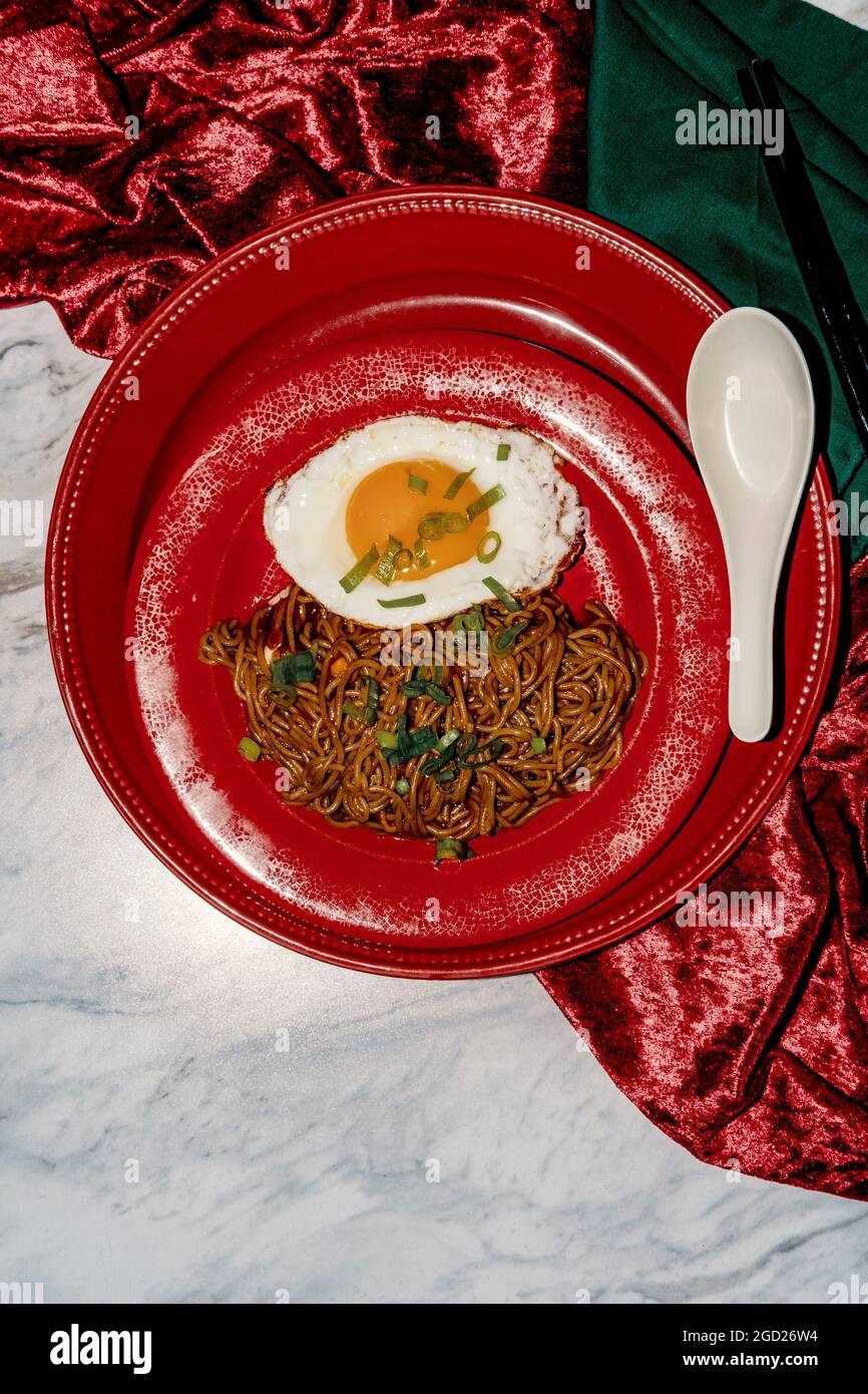 Japanese spicy ramen noodles served with fried sunny side up egg and