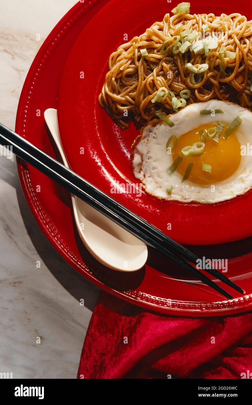Japanese spicy ramen noodles served with fried sunny side up egg and