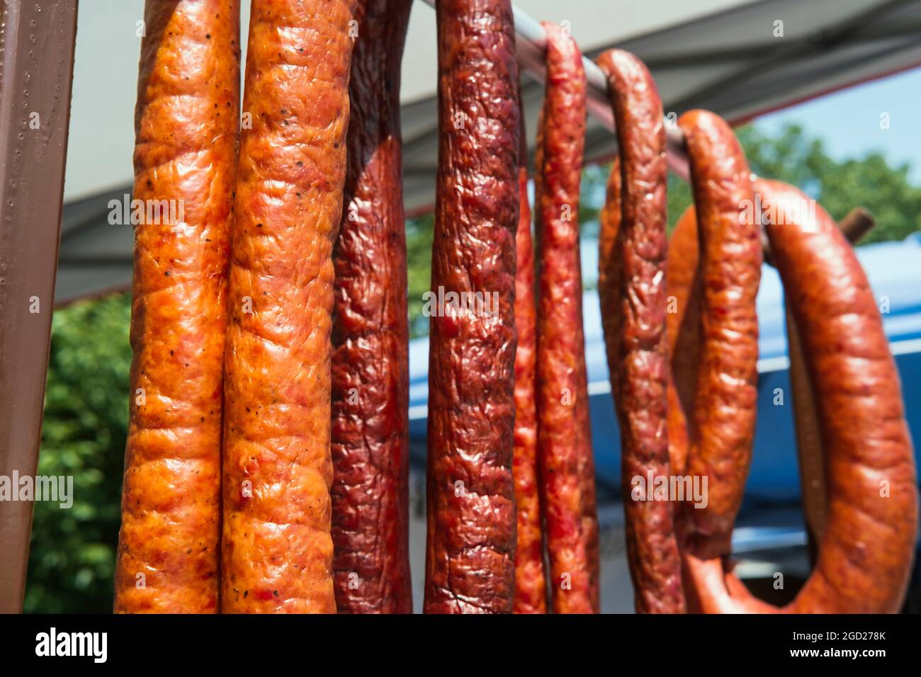 Hanging dried sausage links at local meat market Stock Photo Alamy