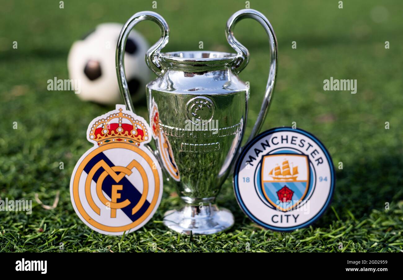 April 16 21 Moscow Russia The Uefa Champions League Cup And The Emblems Of The Football Clubs Manchester City F C And Real Madrid Cf On The Gre Stock Photo Alamy