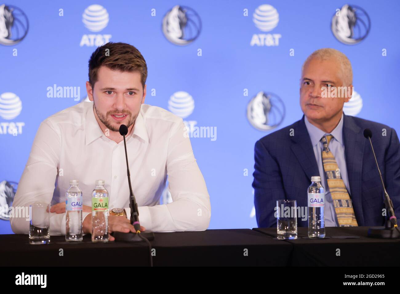 Ljubljana, Slovenia. 10th Aug, 2021. NBA star Luka Doncic and his agent at a press conference after signing a 5-year extension contract with Mavericks.Slovenian NBA star Luka Doncic signed a five-year 207-million-dollar contract extension with the Dallas Mavericks on Tuesday after Mavericks owner Mark Cuban, head coach Jason Kidd, general manager Nico Harrison and advisor Dirk Nowitzki arrived in Slovenia to formalize the deal. Credit: SOPA Images Limited/Alamy Live News Stock Photo