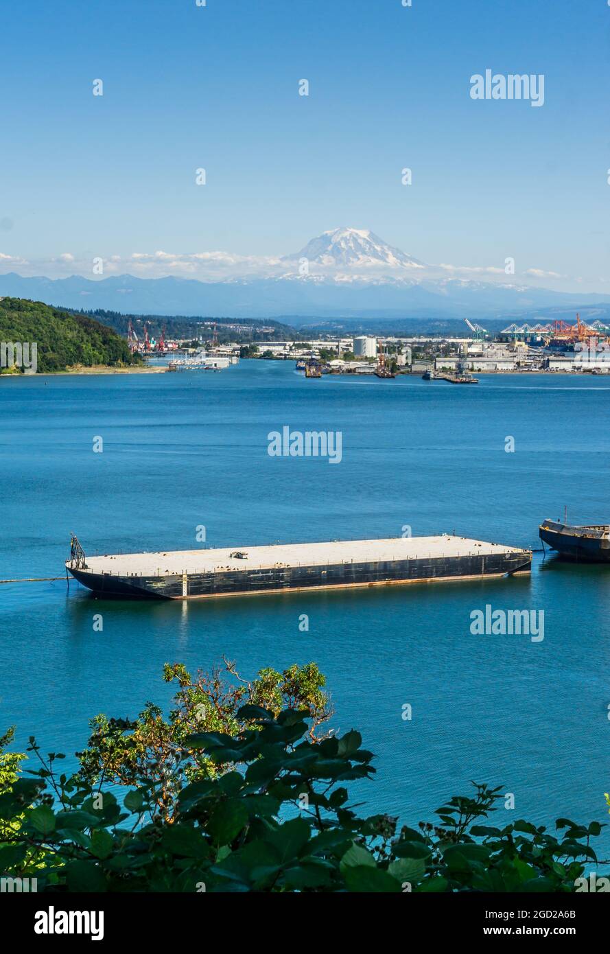 Mount Rainier with little snow in summer and the Port of Tacoma Stock ...