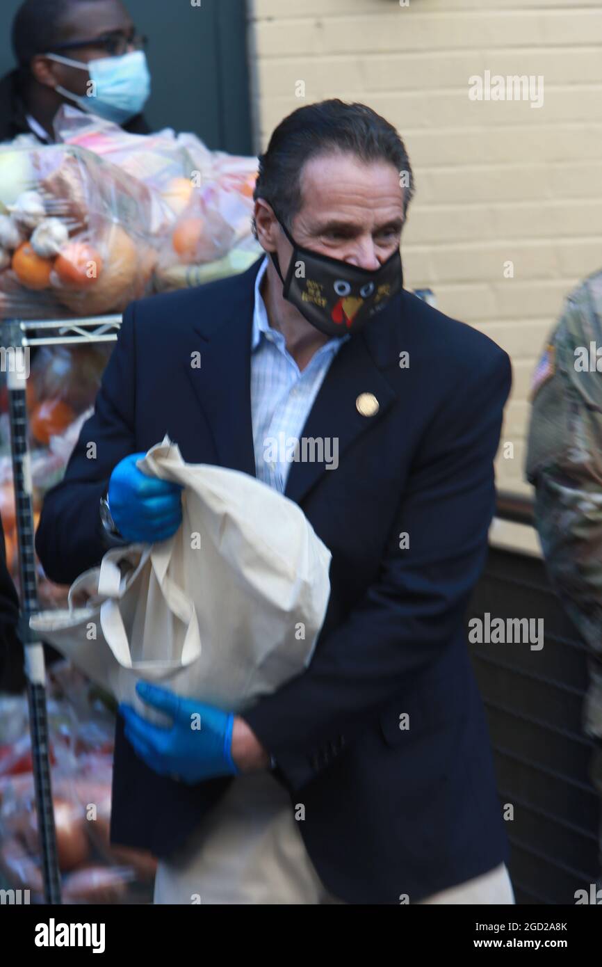 **FILE PHOTO** NY Governor Andrew Cuomo Resigns Amid Harassment Scandal. NEW YORK, NY - NOVEMBER 24: New York State Governor Andrew Cuomo updates New Yorkers on the State's COVID-19 Response and distributes turkeys for the Thanksgiving Holiday at New York Common Pantry on November 24, 2020 in New York City. Credit: mpi43/MediaPunch Stock Photo