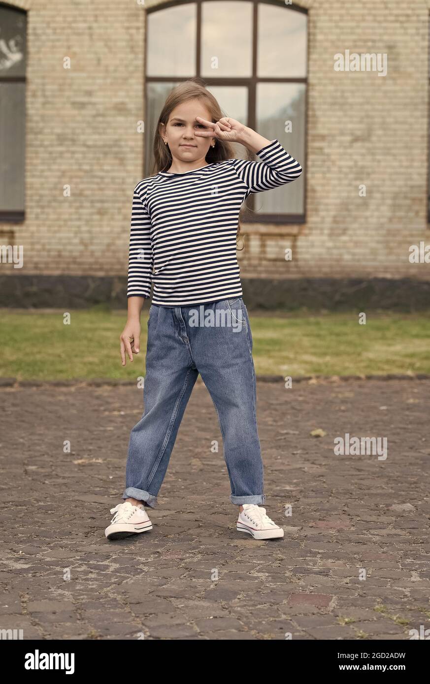Fresh funky beauty. Little child show peace hand sign outdoors. Wearing  casual style. Fashion girl style. Clothing shop. Childrens clothes. Fashion  tr Stock Photo - Alamy