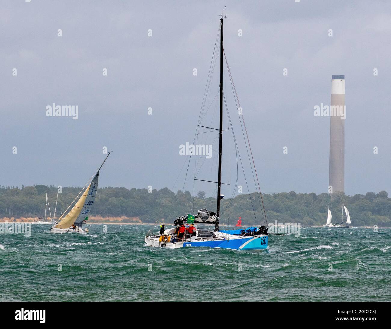 One of the first boats to retire and returning home on 8 August 2021 at the start of the Rolex Fastnet Race, Cowes, Isle of Wight, England Stock Photo