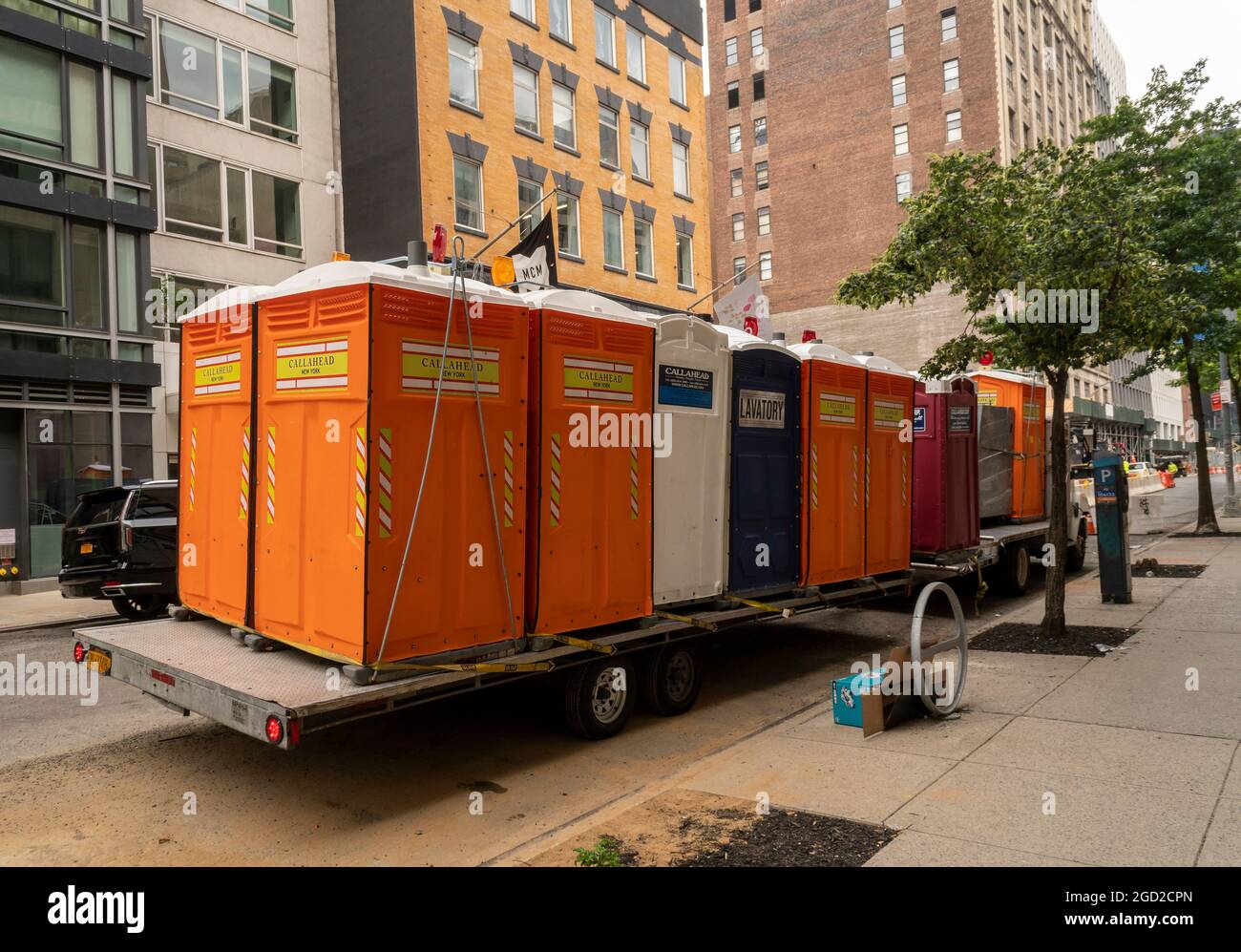 A truck carrying a selection Callahead branded portable toilets in Chelsea in New York on