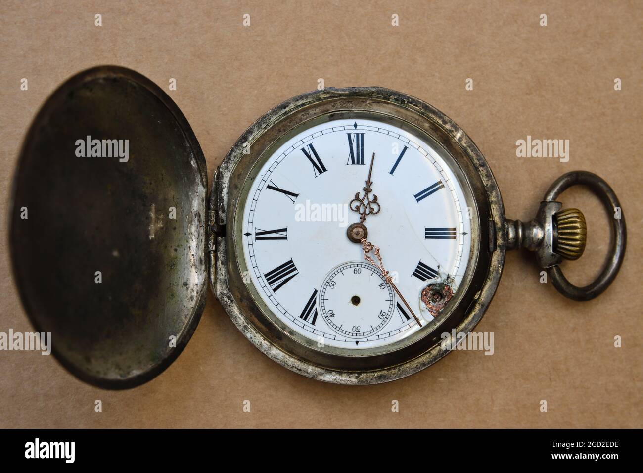 Broken antique pocket watch Stock Photo Alamy