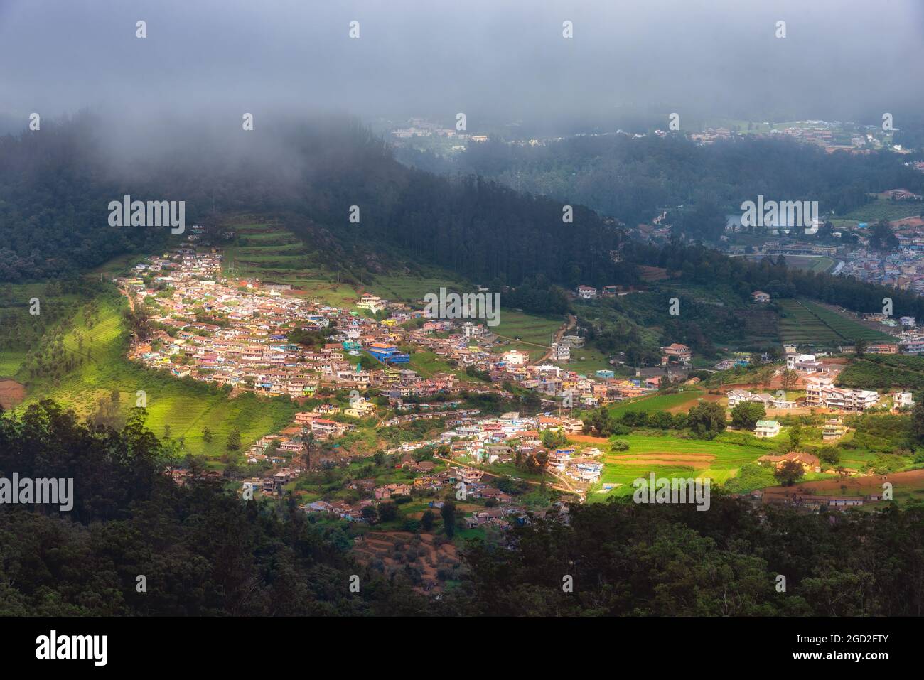 View of Ooty town from Doddabetta View Point, India. Doddabetta is the highest peak in the Nilgiri Mountains at 2,637 metres (8,652 feet) Stock Photo