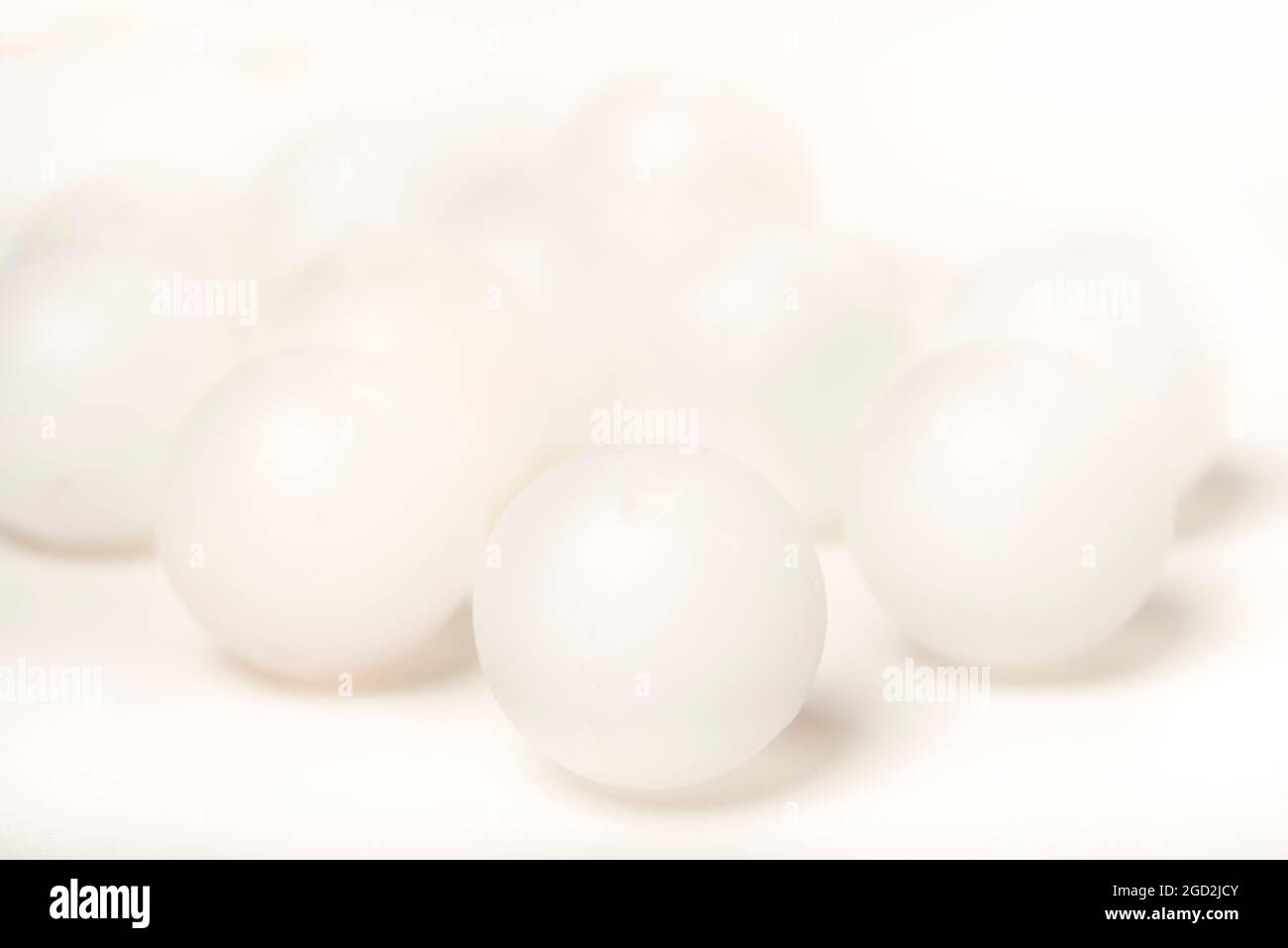 White beer can widgets abstract. Close up. The widget uses a nitrogen