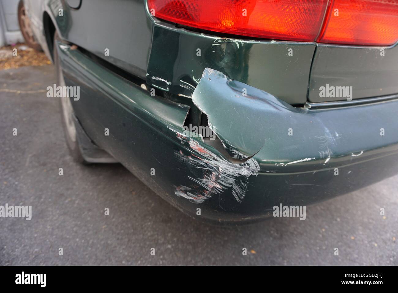 My car was hit and the rear bumper broke. Stock Photo