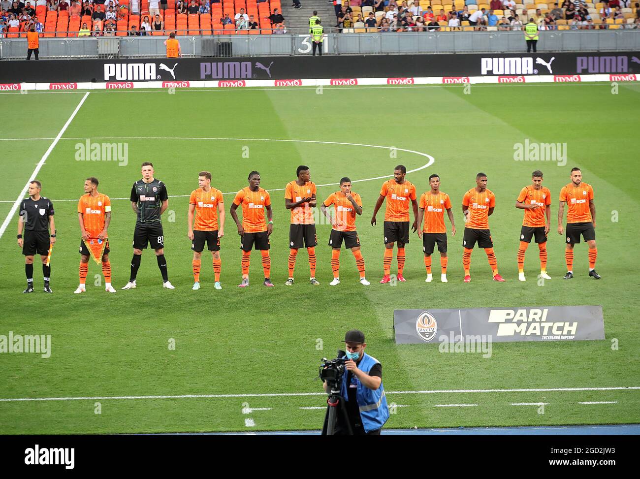 KYIV, UKRAINE - AUGUST 10, 2021 - Players of FC Shakhtar Donetsk stand on the pitch before the 2021-22 UEFA Champions League third qualifying round second leg game against KRC Genk at the NSC Olimpiyskiy, Kyiv, capital of Ukraine. Stock Photo