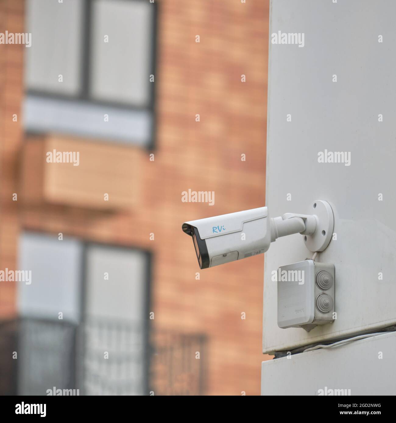 Video surveillance camera on the window building, monitoring the security  of a residential house - Moscow, Russia, August 01, 2021 Stock Photo - Alamy