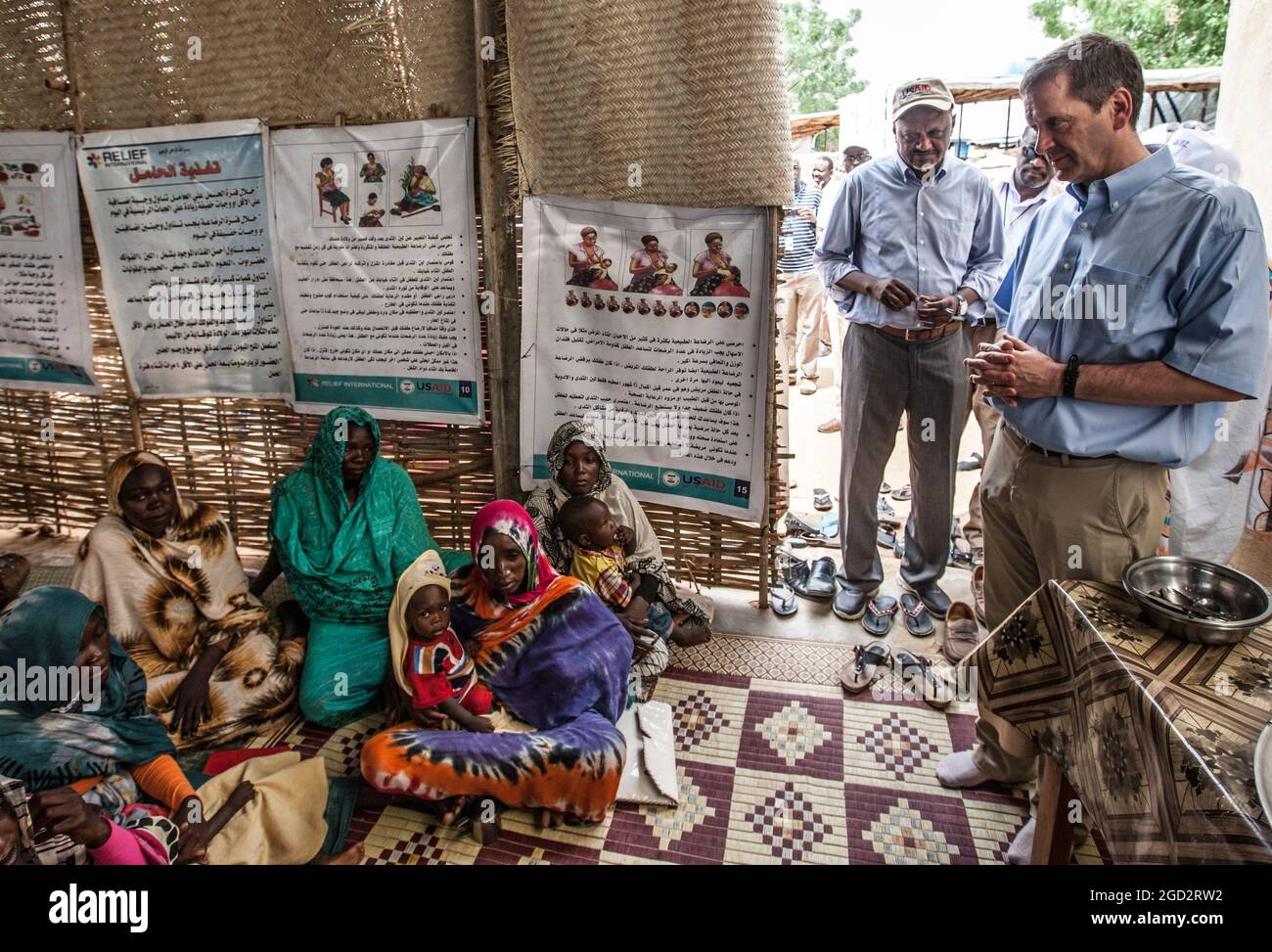 In El Fasher, North Darfur USAID Administrator Mark Green visits a health clinic assisting Sudanese people displaced by conflict in Darfur, Sudan, August 2017 Stock Photo
