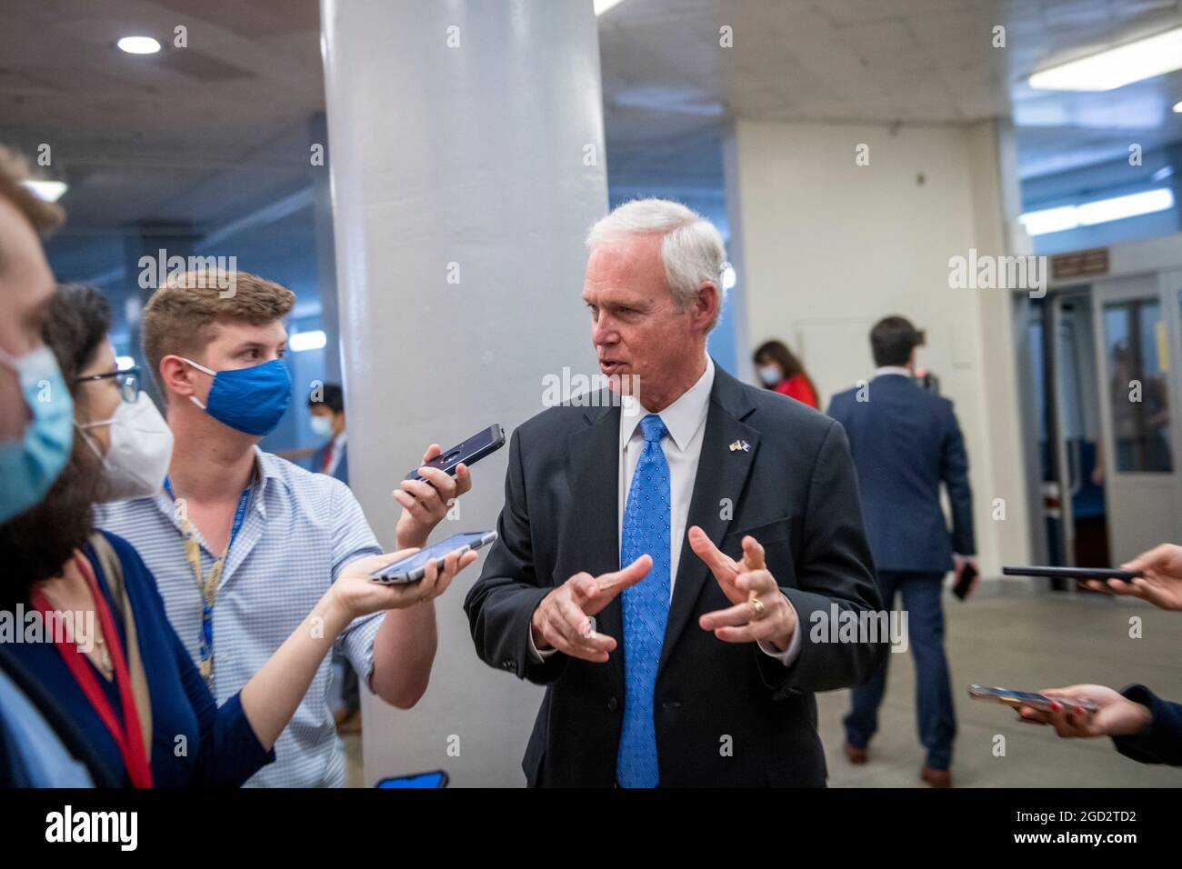 Washington, United States Of America. 10th Aug, 2021. United States Senator Ron Johnson (Republican of Wisconsin) talks with reporters as he walks through the Senate subway during a vote at the US Capitol in Washington, DC, Tuesday, August 10, 2021. The Senate is expected to vote today on final passage of the bipartisan $1 trillion H.R. 3684, Infrastructure Investment and Jobs Act. the Credit: Rod Lamkey/CNP/Sipa USA Credit: Sipa USA/Alamy Live News Stock Photo