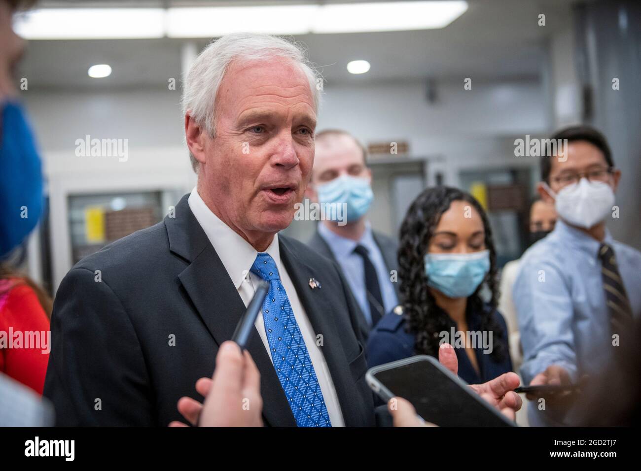 Washington, United States Of America. 10th Aug, 2021. United States Senator Ron Johnson (Republican of Wisconsin) talks with reporters as he walks through the Senate subway during a vote at the US Capitol in Washington, DC, Tuesday, August 10, 2021. The Senate is expected to vote today on final passage of the bipartisan $1 trillion H.R. 3684, Infrastructure Investment and Jobs Act. the Credit: Rod Lamkey/CNP/Sipa USA Credit: Sipa USA/Alamy Live News Stock Photo