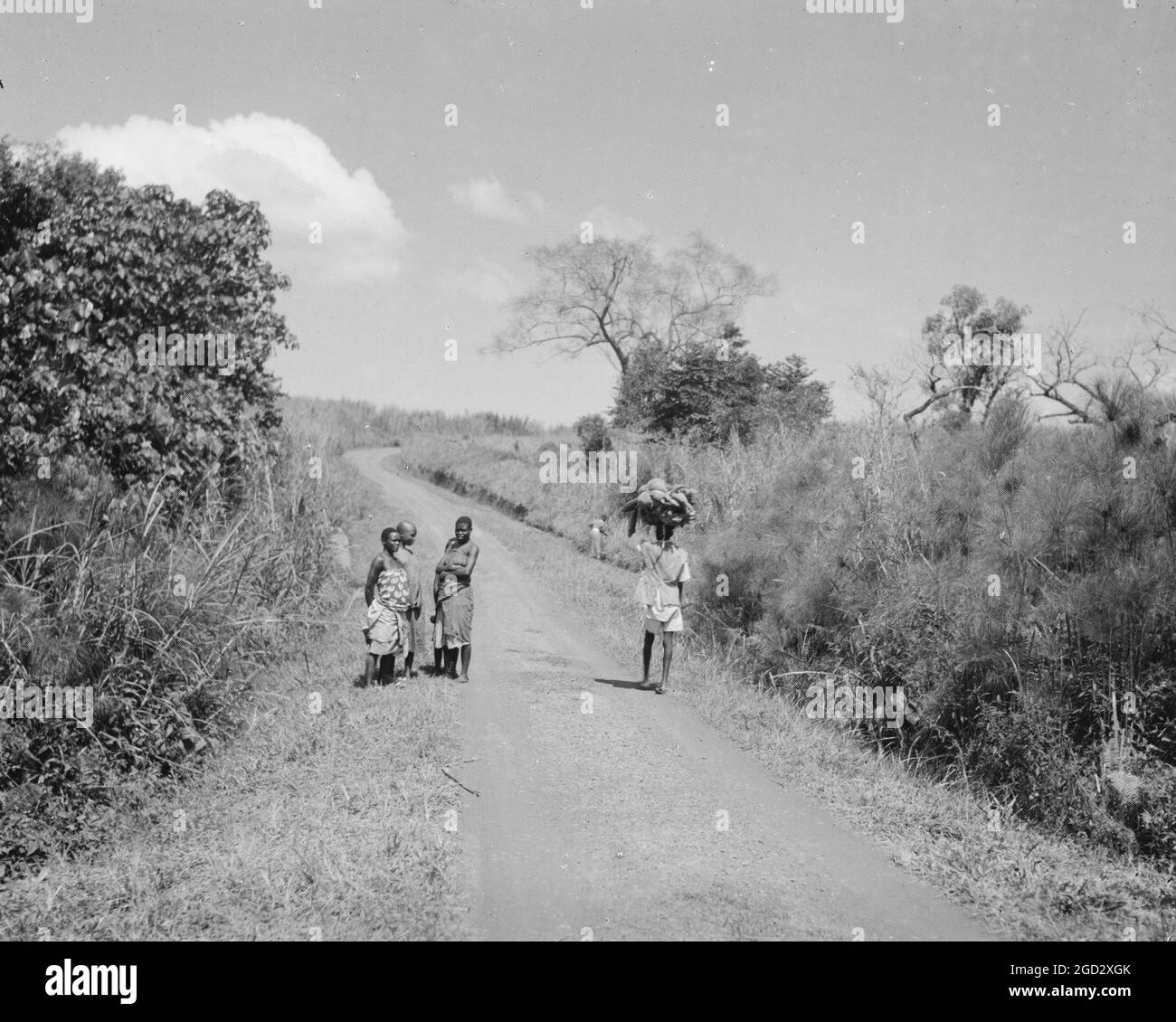 Uganda women on the road to Fort Portal ca. 1936 Stock Photo