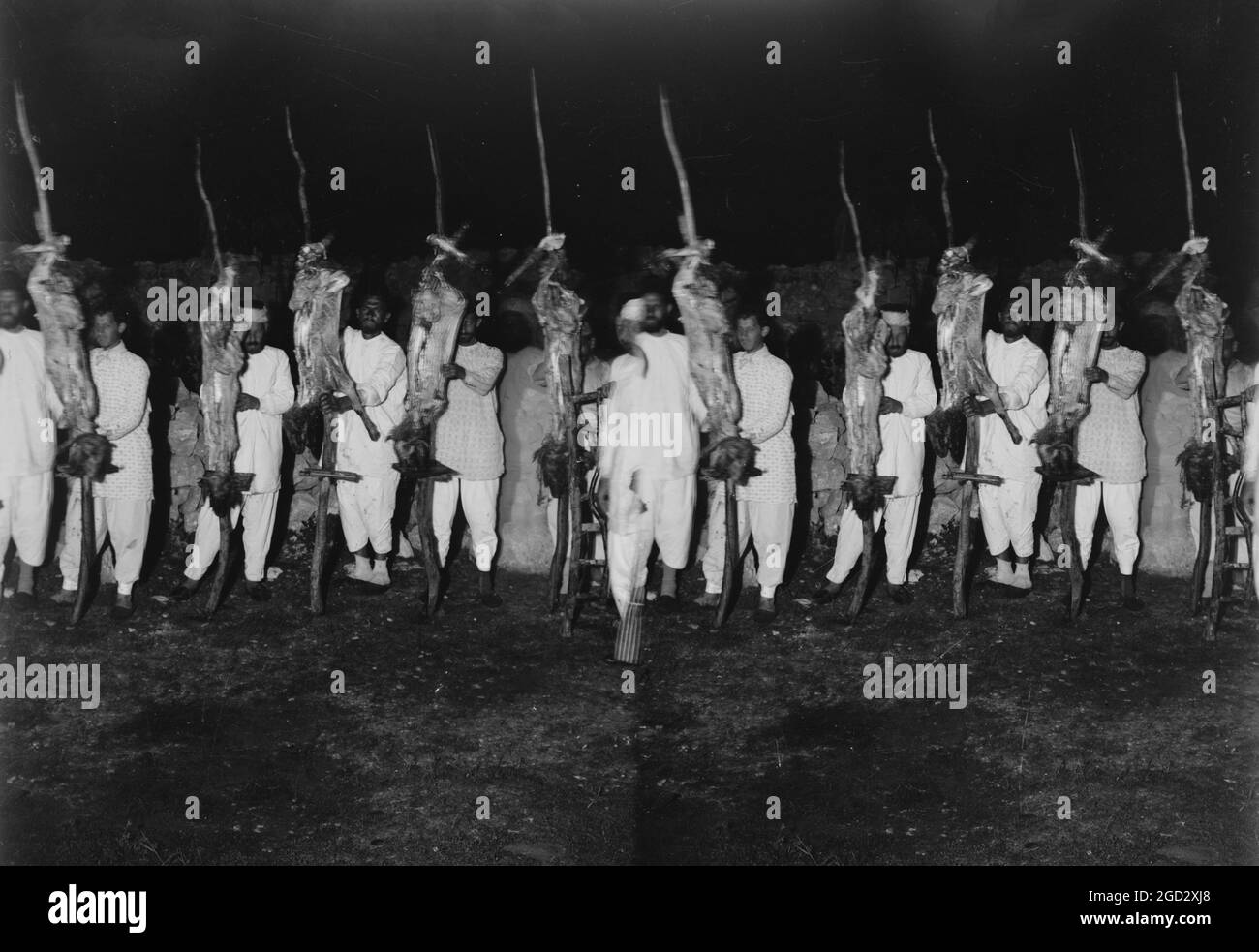 The Samaritan Passover on Mt. Gerizim, Samaritan men with prepared carcasses ready for the oven. ca. 1900 Stock Photo