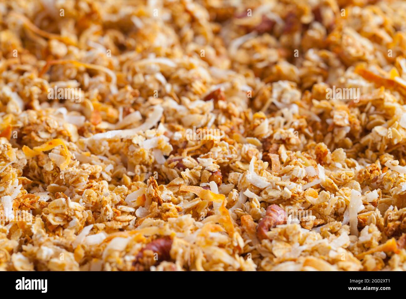 Pile of Homemade Granola Cereal Close Up Background Texture. Stock Photo
