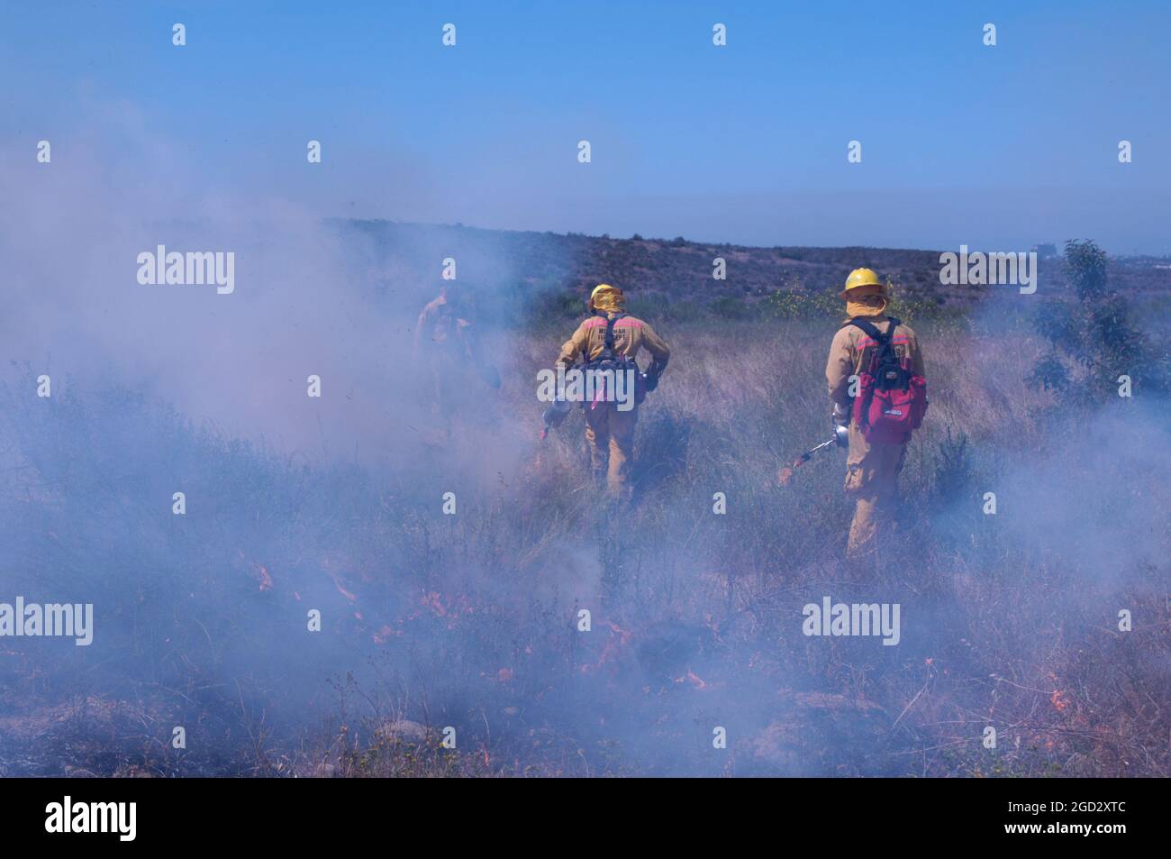 Miramar firefighters working brush burn Stock Photo