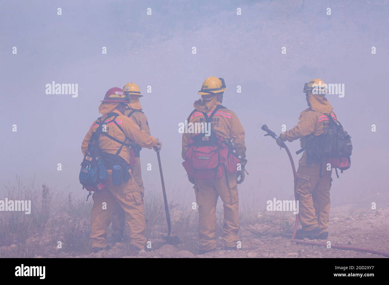 Miramar Firefighters in thich smoke Stock Photo