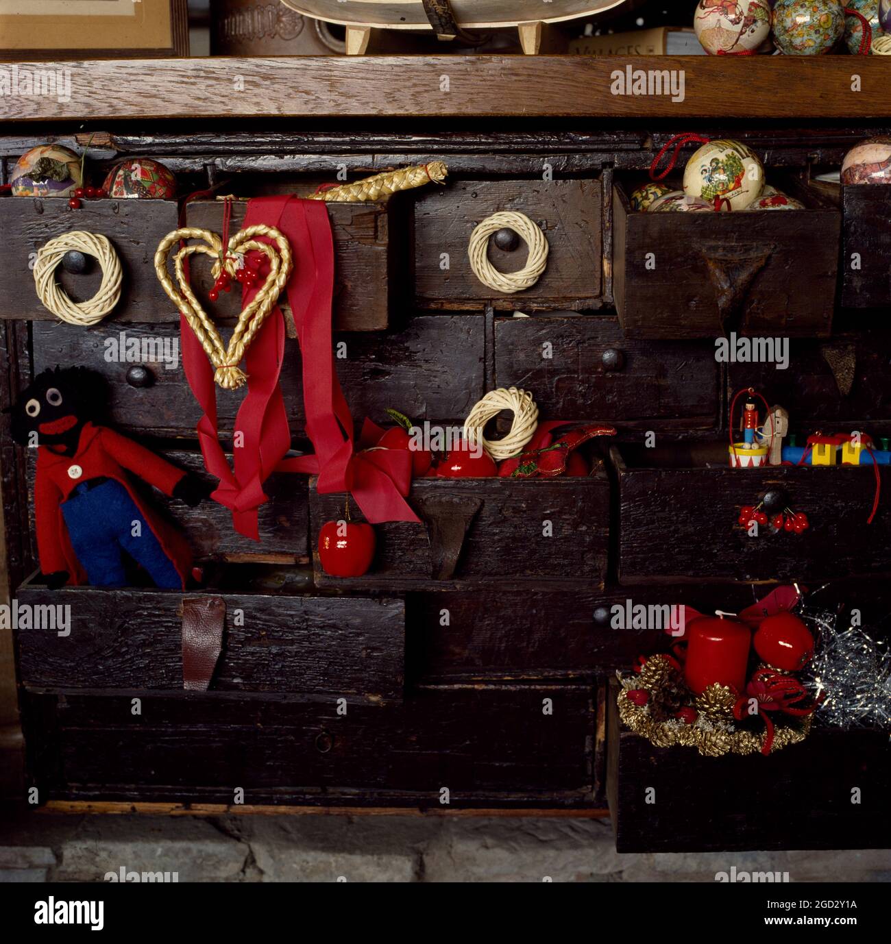 Closeup of antique furniture used for storage of christmas decortions. Stock Photo