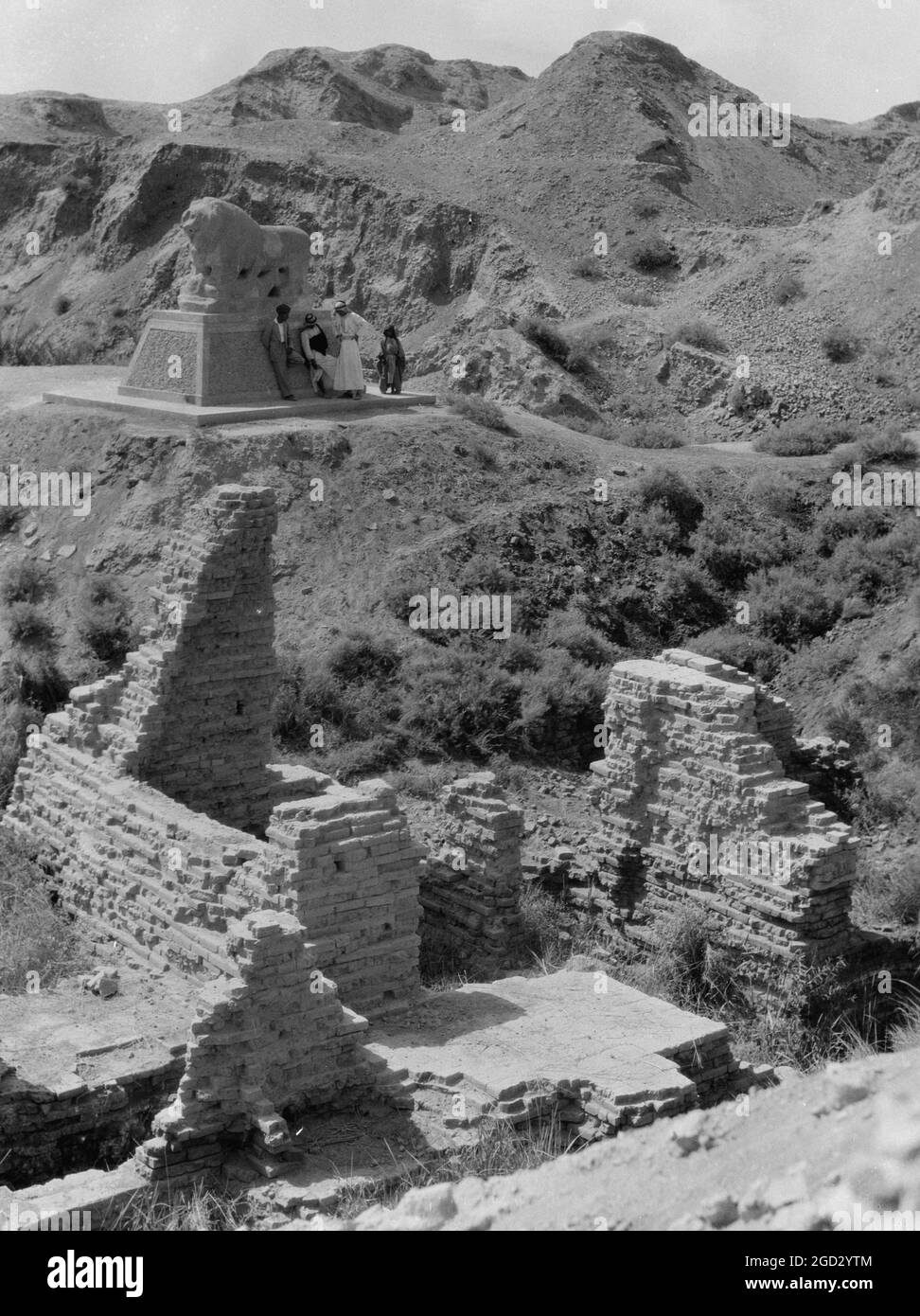 Ruins of Babylon the great in Iraq, views of crumbling ruins. Basalt lion. Marking Daniel's den ca. 1932 Stock Photo