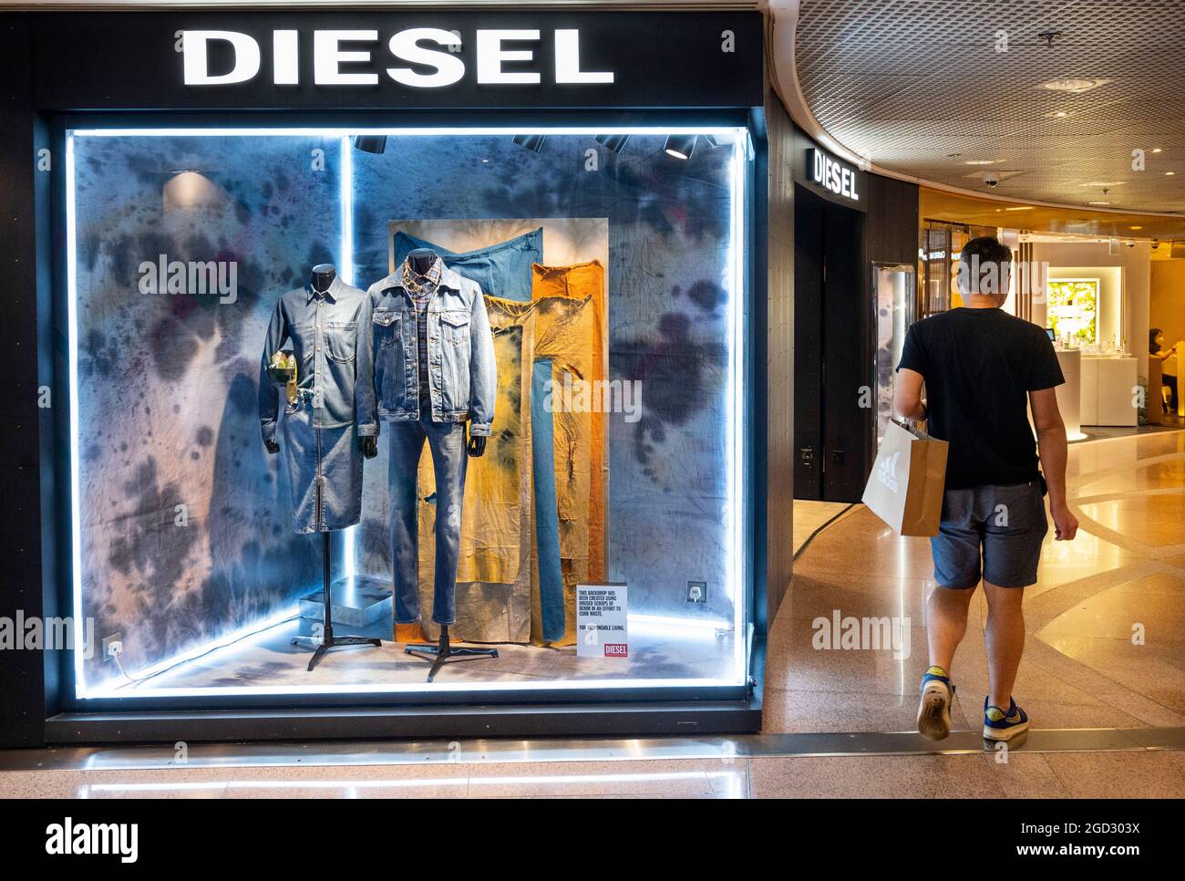 A shopper walks past the Italian retail clothing brand Diesel store in Hong  Kong. (Photo by Budrul Chukrut / SOPA Images/Sipa USA Stock Photo - Alamy