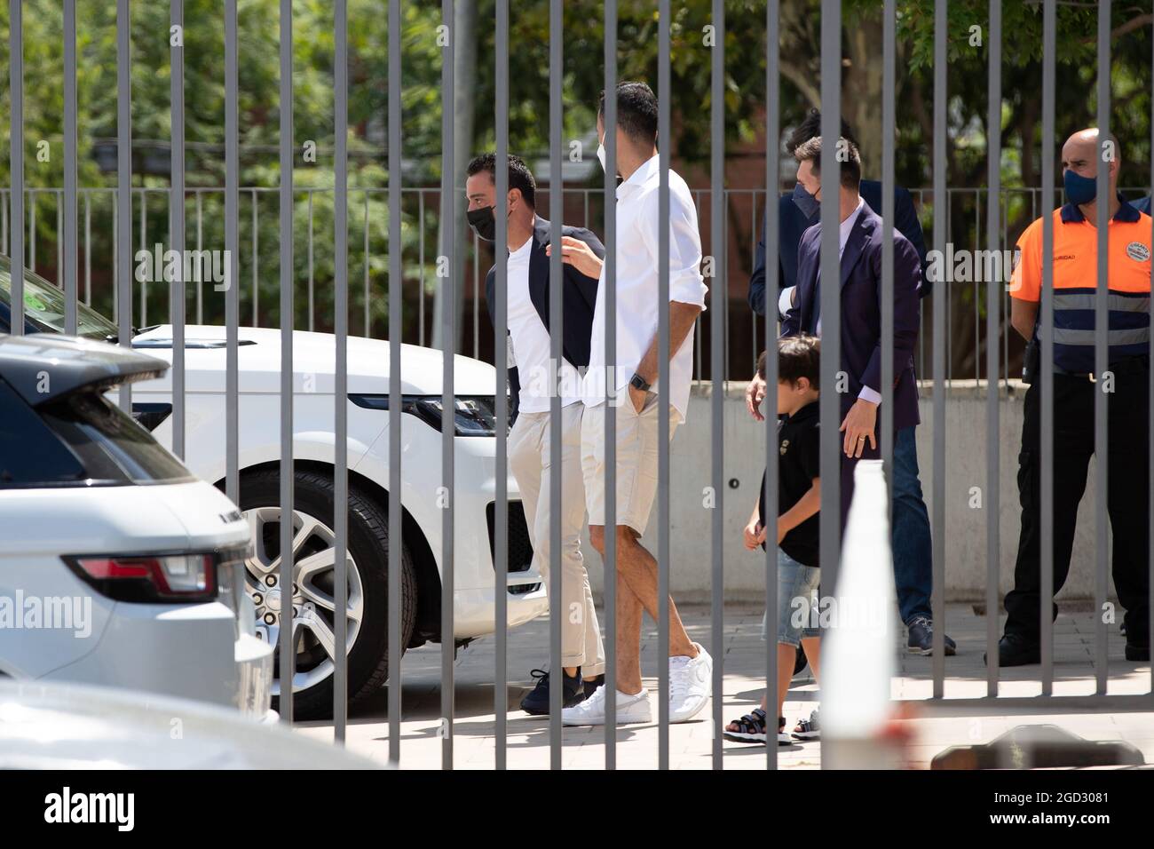 Xavi Hernandez and Sergio Busquets arrives to Lionel Messi farewell press conference at Auditori 1899 at Camp Nou Stadium in Barcelona, Spain. (Credit: David Ramirez) Stock Photo