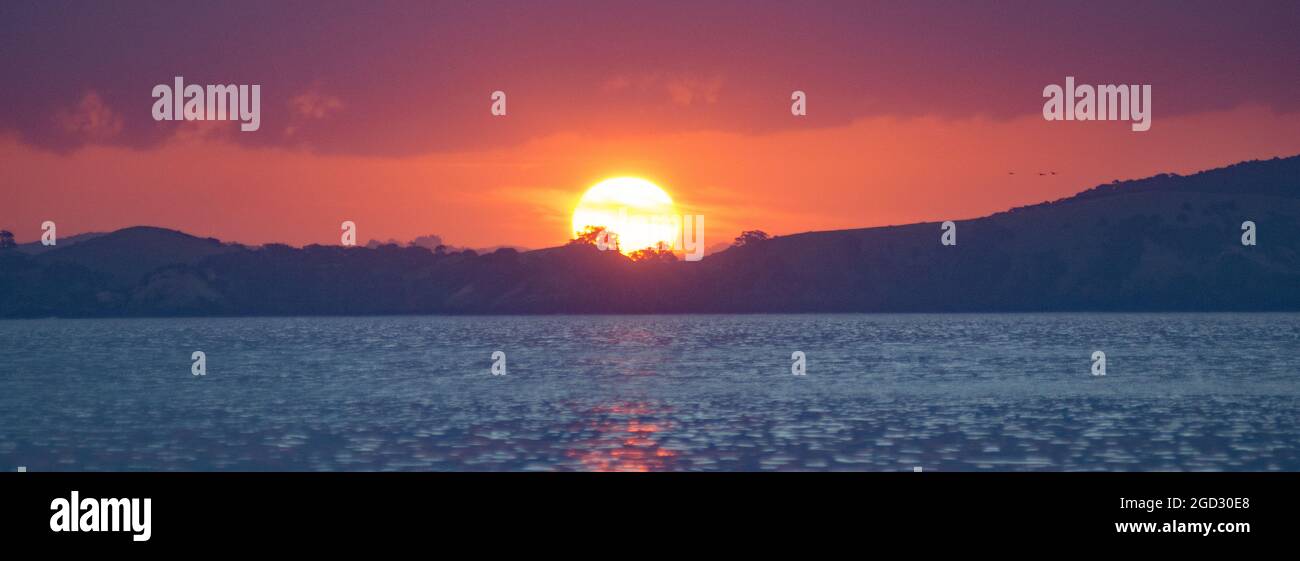 Sunset over Russel Bay of Islands New Zealand Stock Photo