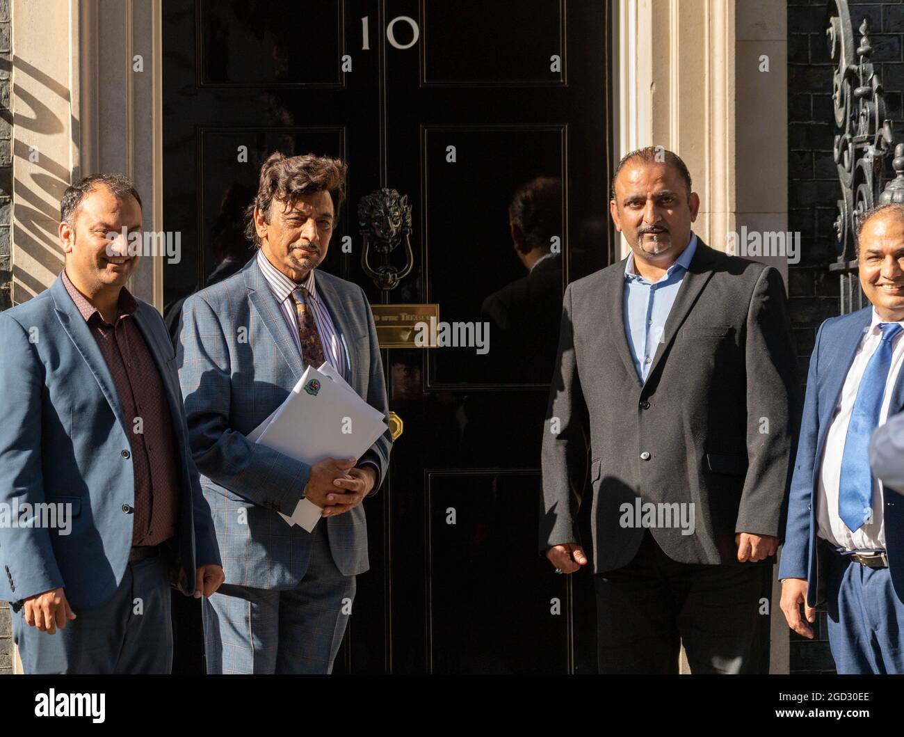 London, UK. 10th Aug, 2021. A delegation from the UK Pakistan Business Council took a petition to Boris Johnson in Downing Street, protesting about Pakistan being kept on the 'red list' when other surrounding countries have been moved off the red list. Credit: Ian Davidson/Alamy Live News Stock Photo