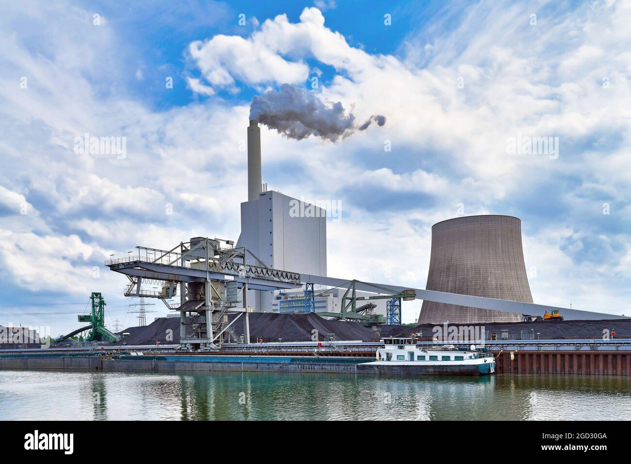 Coal steam power plant in Karlsruhe in Germany used for generation of electricity and district heating from hard coal Stock Photo