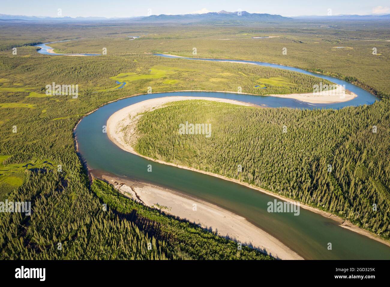 Looking down the southern end of the John River north of the Arctic Circle in Alaska toward its junction with the Koyukuk river and Bettles. Stock Photo